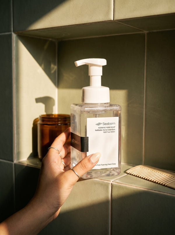 Seaborn foaming hand soap bottle on a bathroom shelf